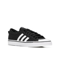 Baskets basses en toile noires adidas