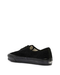 Baskets basses en toile noires Vans