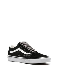 Baskets basses en toile noires Vans