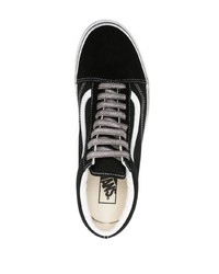 Baskets basses en toile noires Vans