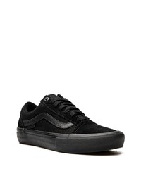 Baskets basses en toile noires Vans