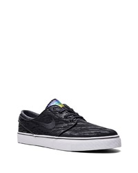 Baskets basses en toile noires Nike