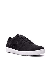 Baskets basses en toile noires Nike