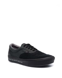 Baskets basses en toile noires Vans