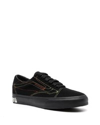 Baskets basses en toile noires Vans