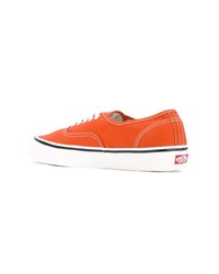 Baskets basses en toile orange Vans