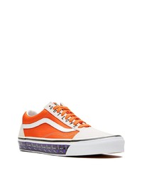 Baskets basses en toile orange Vans