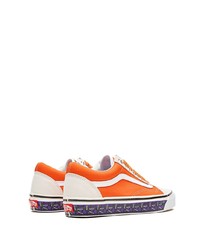 Baskets basses en toile orange Vans