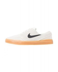 Baskets basses imprimées beiges Nike