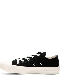 Baskets basses noires et blanches Comme des Garcons