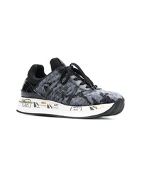 Baskets basses noires et blanches Premiata