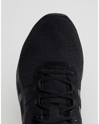 Baskets basses noires Asics