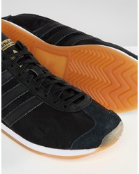 Baskets en cuir noires adidas