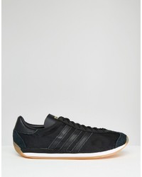 Baskets en cuir noires adidas