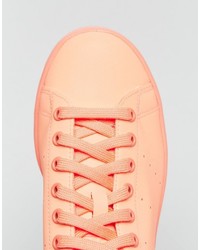 Baskets en cuir orange adidas