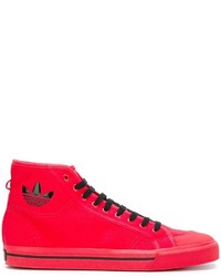 Baskets en cuir rouges Adidas By Raf Simons