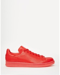 Baskets en cuir rouges adidas