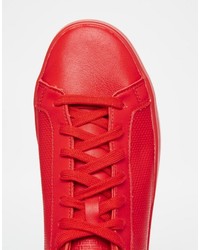 Baskets en cuir rouges adidas