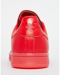 Baskets en cuir rouges adidas