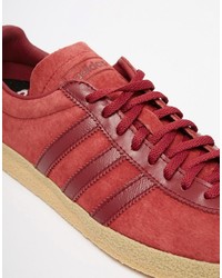 Baskets en cuir rouges adidas