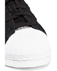 Baskets en daim imprimées noires adidas