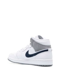 Baskets montantes en cuir blanc et bleu marine Nike