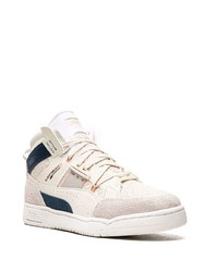 Baskets montantes en cuir blanc et bleu marine Puma