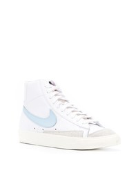 Baskets montantes en cuir blanc et bleu Nike