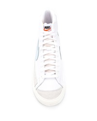 Baskets montantes en cuir blanc et bleu Nike