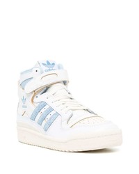 Baskets montantes en cuir blanc et bleu adidas