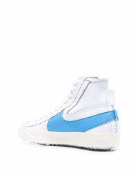 Baskets montantes en cuir blanc et bleu Nike