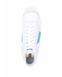 Baskets montantes en cuir blanc et bleu Nike