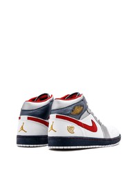 Baskets montantes en cuir blanc et rouge Jordan