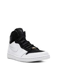 Baskets montantes en cuir blanches et noires Jordan