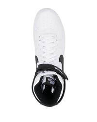 Baskets montantes en cuir blanches et noires Nike