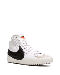 Baskets montantes en cuir blanches et noires Nike