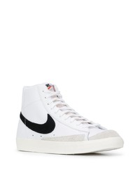 Baskets montantes en cuir blanches et noires Nike