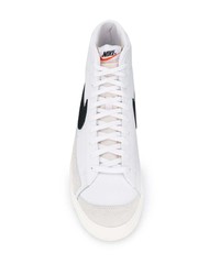 Baskets montantes en cuir blanches et noires Nike