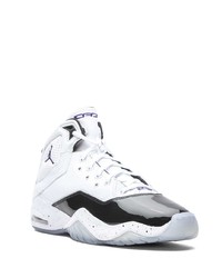 Baskets montantes en cuir blanches et noires Jordan