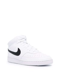 Baskets montantes en cuir blanches et noires Nike