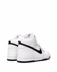 Baskets montantes en cuir blanches et noires Nike