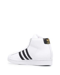 Baskets montantes en cuir blanches et noires adidas