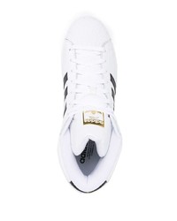 Baskets montantes en cuir blanches et noires adidas