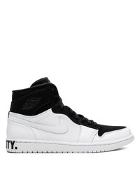 Baskets montantes en cuir blanches et noires Jordan