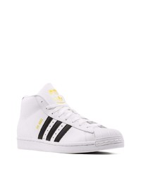 Baskets montantes en cuir blanches et noires adidas