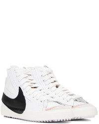 Baskets montantes en cuir blanches et noires Nike