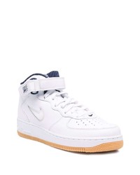 Baskets montantes en cuir blanches Nike