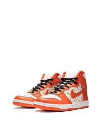 Baskets montantes en cuir imprimées orange Nike