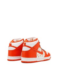 Baskets montantes en cuir imprimées orange Nike