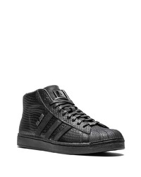 Baskets montantes en cuir imprimées serpent noires adidas